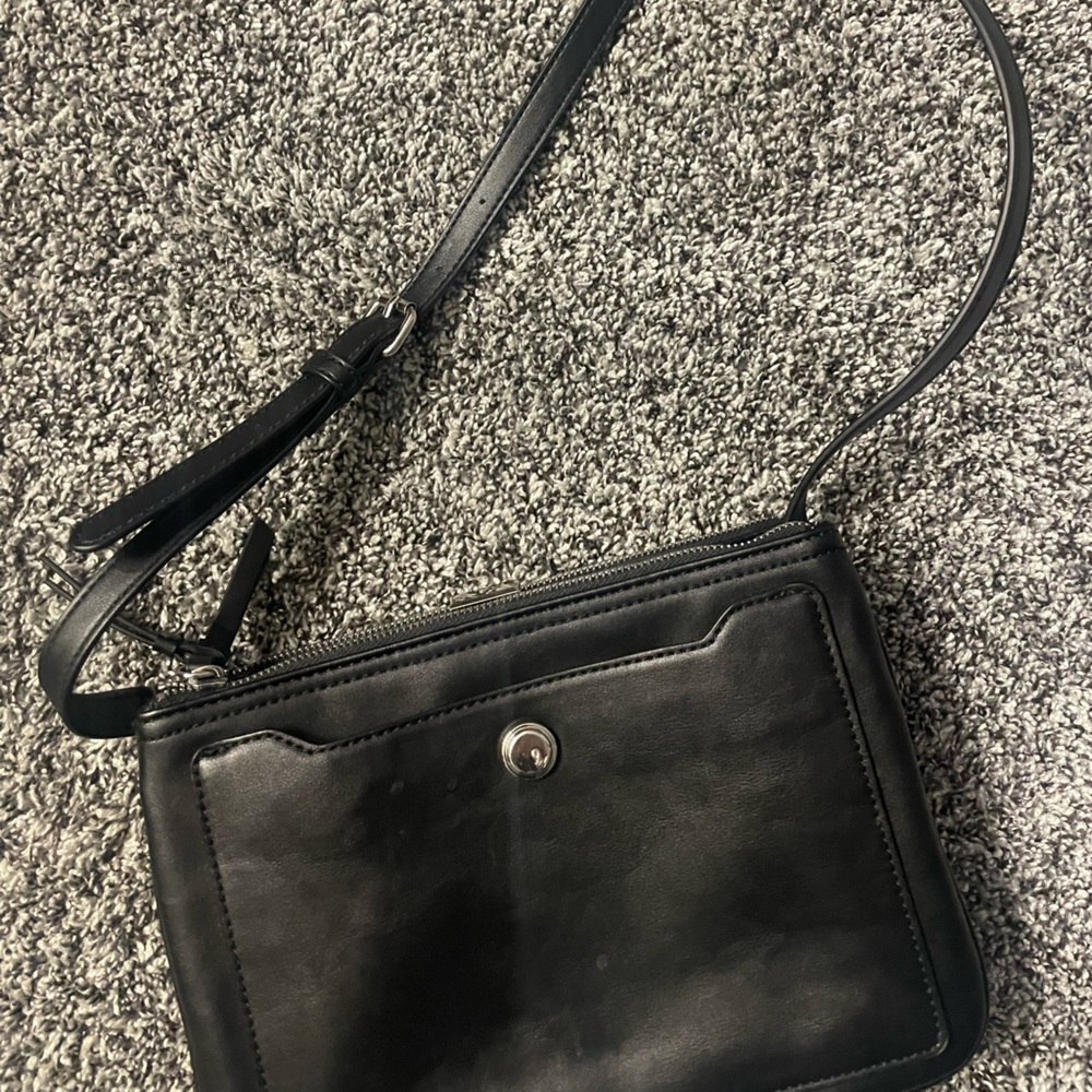 Macys black handbag. LOTS of pockets.